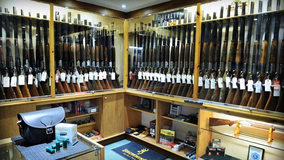 Trulock and Harris gun room with display cabinets